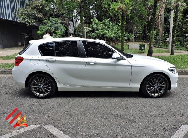 BMW 120i LCI COMFORT TP 2.0 2018 $78.900.000 - Imagen 7